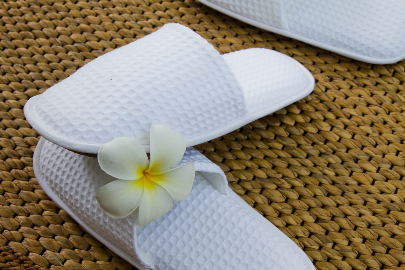 Slippers and frangipani