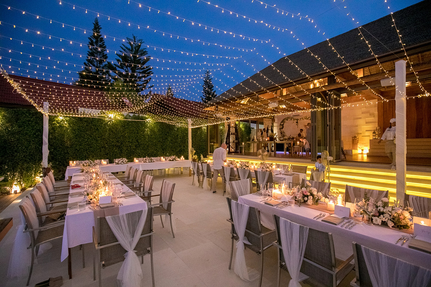Reception dinner set under the palms